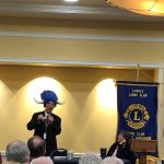District Governor Charlie Croft in his special hat